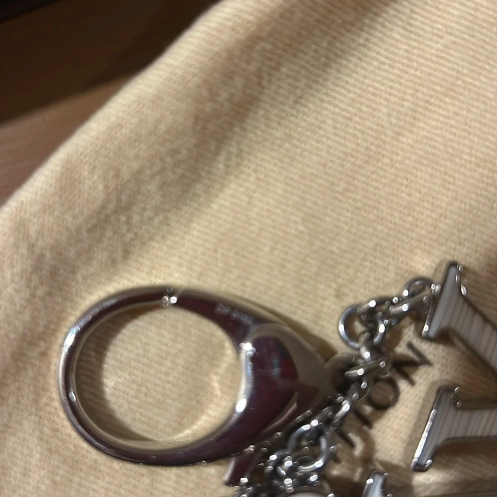 Louis Vuitton Fleur d’ Epi Bag Charm Resin Brass. Nearly New Certified Authentic